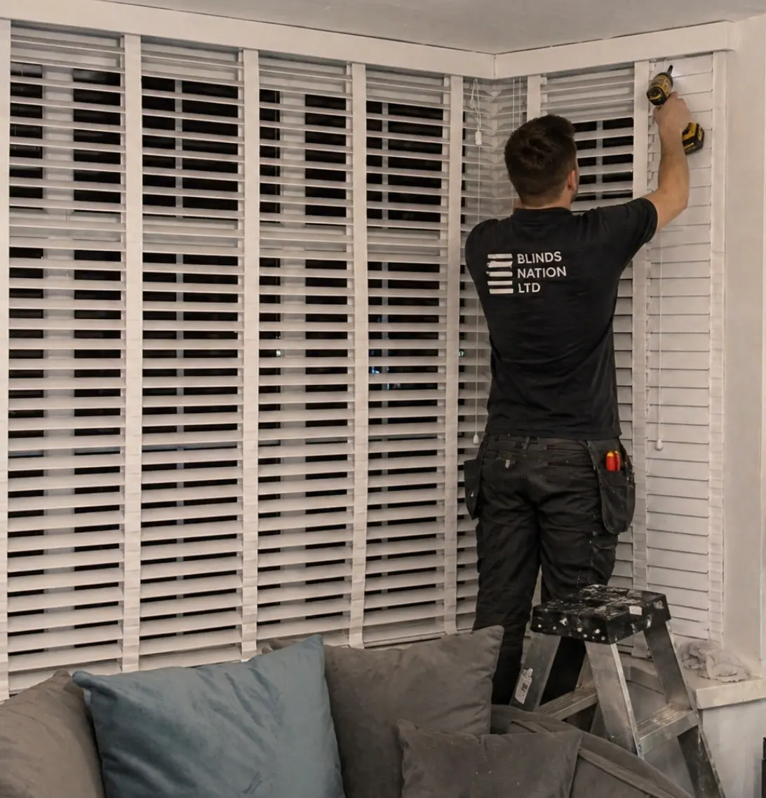 Faux wood slat blinds at a window – Selly Oak Blinds